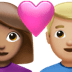 👩🏽‍❤️‍👨🏼 couple with heart: woman, man, medium skin tone, medium-light skin tone display on Apple